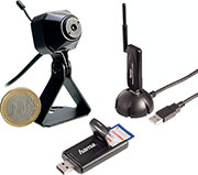 Bild 1: 2,4-GHz-Sendesysteme sind extrem kompakt realisierbar und somit auch gut unauffällig zu installieren. Links ein komplettes Mini-Kamera-Sendersystem, rechts ein Mini-WLAN-Sender, in der Mitte ein Bluetooth-Stick, der sogar noch einen Speicherkartenleser enthält. Besonders Geräten wie letzterem Bluetooth-Stick sieht man seine Hauptfunktion zunächst nicht an. Bild 1: 2,4-GHz-Sendesysteme sind extrem kompakt realisierbar und somit auch gut unauffällig zu installieren. Links ein komplettes Mini-Kamera-Sendersystem, rechts ein Mini-WLAN-Sender, in der Mitte ein Bluetooth-Stick, der sogar noch einen Speicherkartenleser enthält. Besonders Geräten wie letzterem Bluetooth-Stick sieht man seine Hauptfunktion zunächst nicht an.