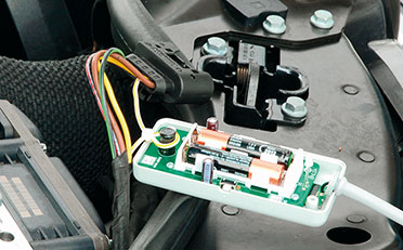 Bild 6: Hier ist die Leitung um den Sensor gelegt Bild 6: Hier ist die Leitung um den Sensor gelegt